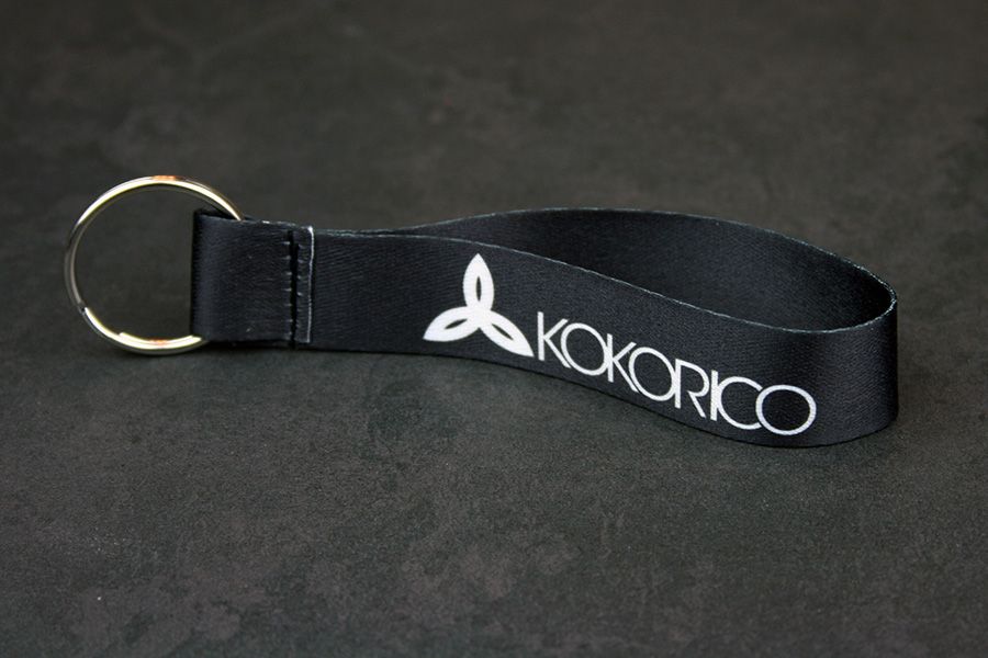 Zwarte stoffen sleutelhanger voor Kokorico